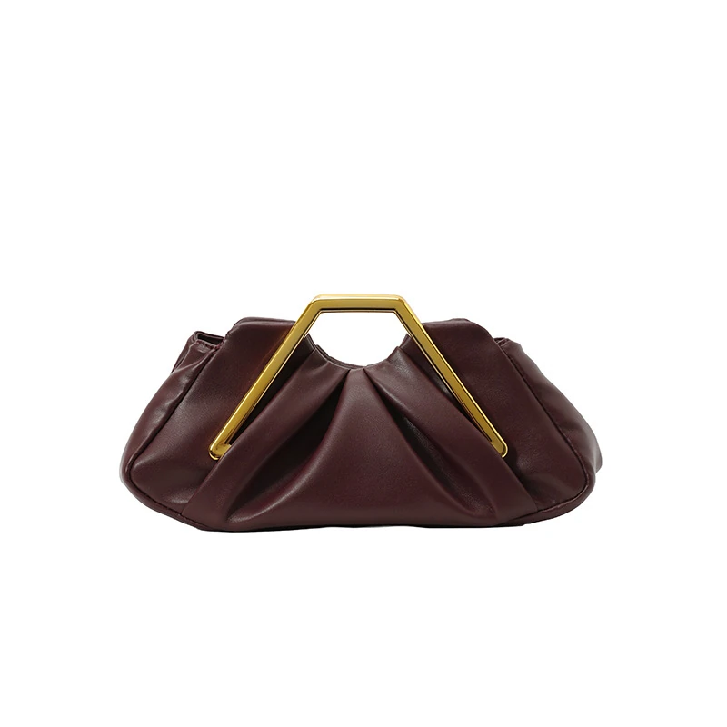 Burgundy pleated cloud clutch with angular gold-tone handle, front view