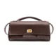 Dark brown structured flap bag with side strap points and gold-tone clasp