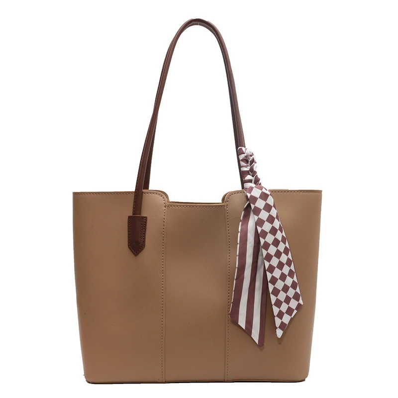 Tan everyday tote with long handles and tied scarf