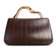 Brown paneled evening clutch with vertical front seams