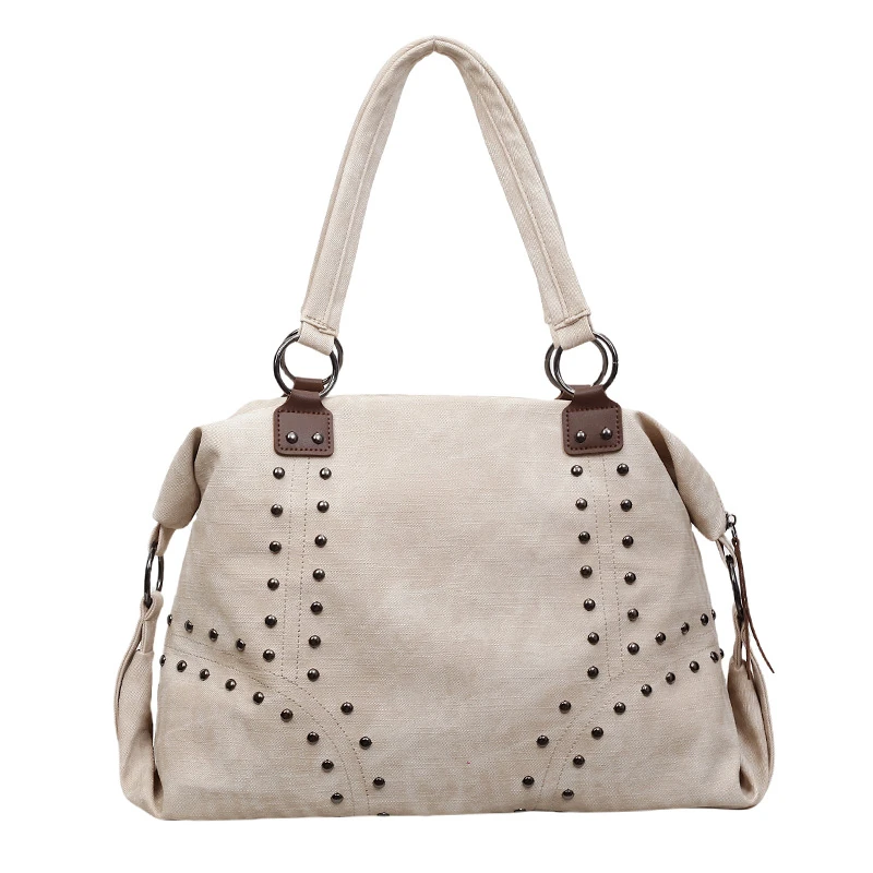 Light beige slouchy shoulder bag with V-shaped stud pattern