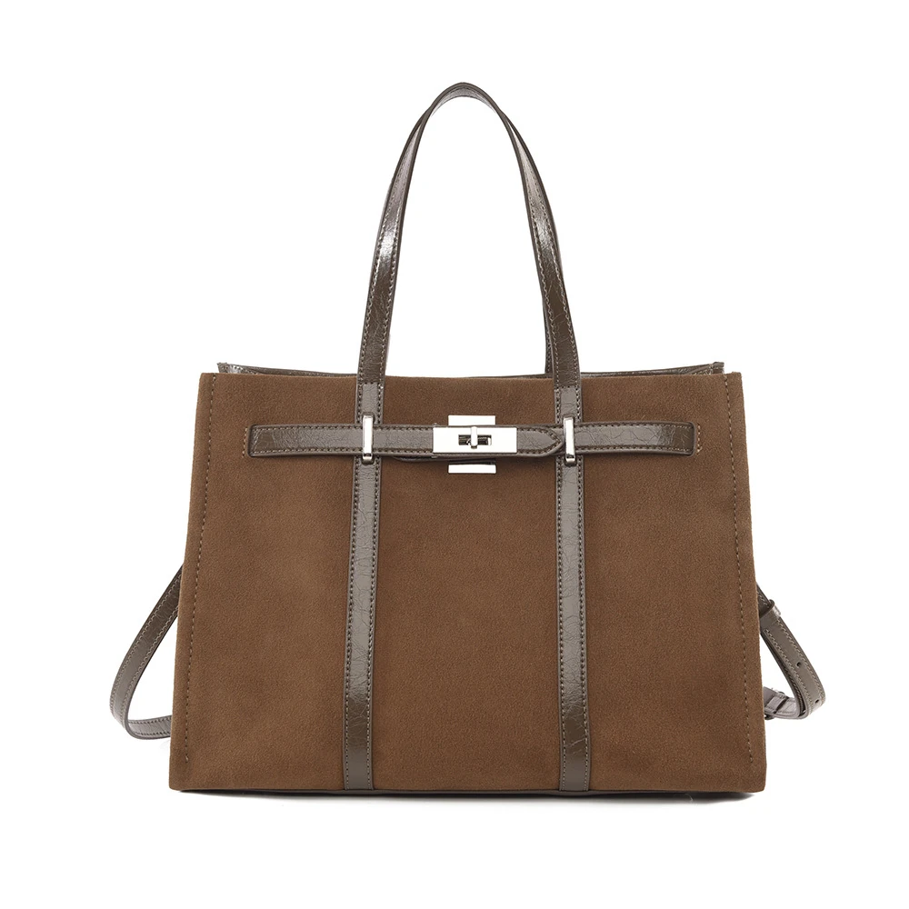 Warm brown boxy tote with metal clasp and long handles
