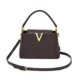 Dark brown structured trapeze bag with top handle and long strap