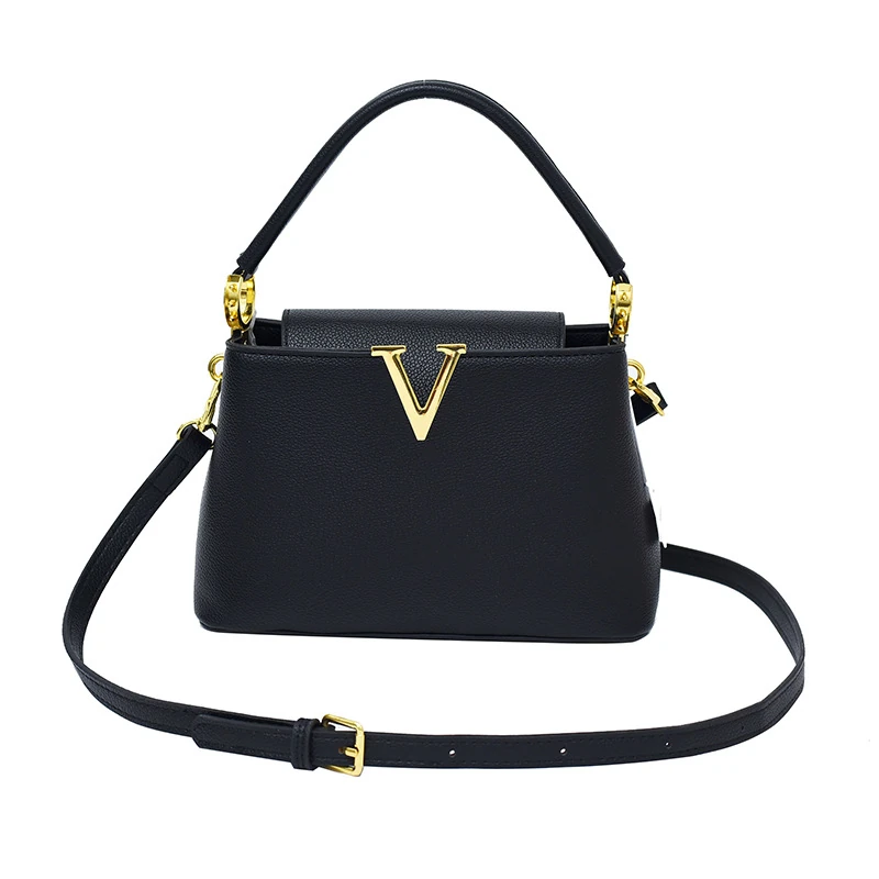 Navy structured top-handle bag with long adjustable strap