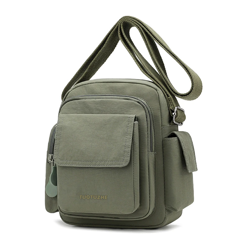 Olive utility crossbody bag with adjustable strap and front pocket