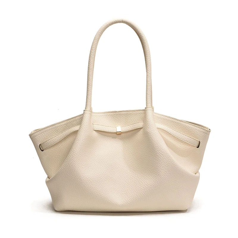 Cream soft tote with folded sides and front strap detail